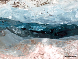 The ice is more transparent in a protected fissure