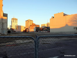 A vacant lot where buildings stood