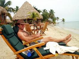 Bill relaxing on the beach (yes, there is a
                            lot of relaxing going on!)