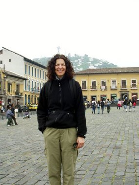 Lori, with the statue of Virgin Mary sprouting out of her head, stands in the San Francisco Plaza