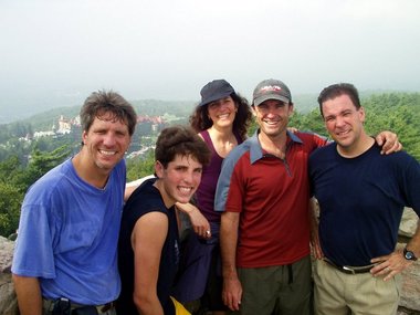 The team at the top of the Smiley Memorial, with the lodge in the background