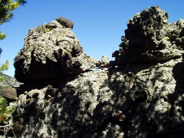 The rock that looks like concrete; Rose Knob Peak peeks through the hole