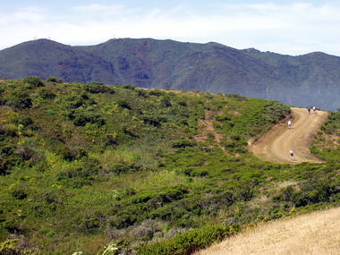Lori and Milon lead the charge followed by Eric and David, with Montara Mountain in the background