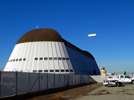 The zeppelin disappears behind Hangar 1