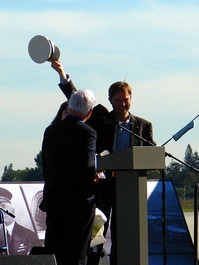 von Zeppelin presents Brian with a hat