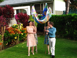 Maya, Lee, Ayla, and Lisa carry the chuppah