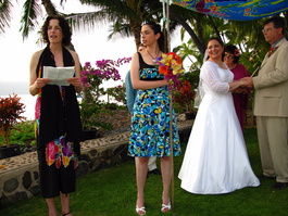 Lori reads the seven traditional Jewish wedding blessings in Hebrew