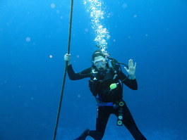 Lori can't quite get the "live long and prosper" hand sign
