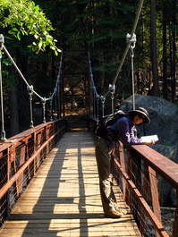 Lori on a foot bridge over the south fork of the Kings River