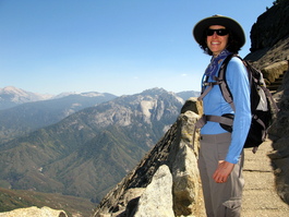 Lori descends Moro Rock with Castle Rocks in the background