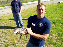 Joel presents a two-year-old alligator