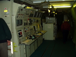 Rows of displays on board the Kuiper, facing aft
