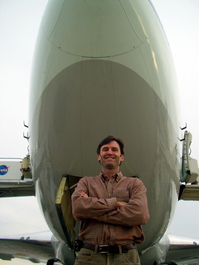 My ex-wife was once doing a photo shoot for her client, United Airlines, and the photographer took a great power executive shot of her under the new 777. Here was my opportunity to strike the same pose! Ha!