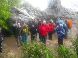 The group pauses for a very waterlogged
                       photograph at Goat Rock