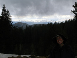 Lori at Potter Pass with Banner Peak and
                            Mt. Ritter jutting out of the Ritter Range