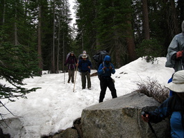 Lori playing sweep in the snowbound track