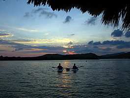 Steven and Denise paddle off into the sunset