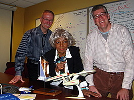 Nichelle poses with PT's Star Trek paraphernalia, Roger, and Doug