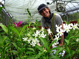 Lori enjoys the orchids