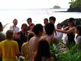 Lori throws flowers on the happy couple from the US and Philippines