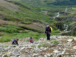 Lori climbing to the top of the falls