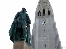 A statue of Leif Ericson in front of the Hallgrímskirkja church