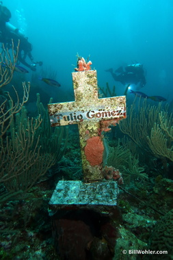 A memorial for Tulio Gomez, a divemaster and friend of Jesse's, who died from a heart attack here