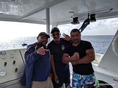 Captain Eddy, engineer German, and divemaster Jesse