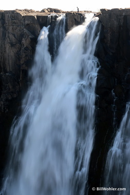 A fisherman above the Victoria Falls