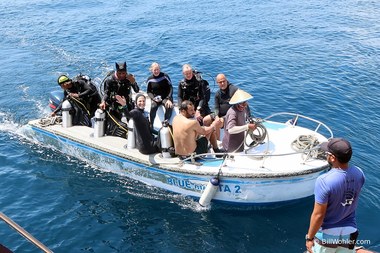 Lori and Deb back from their last dive of the trip (with divemaster Batman)