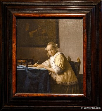 A Lady Writing a Letter by Johannes Vermeer, 1665