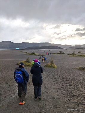 Dan and Christine start across the beach, which was probably once an old moraine