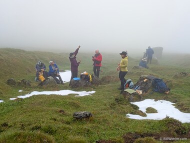 We play "find the sun" while eating lunch in a thick fog