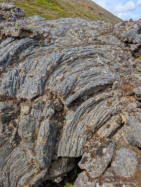 The curves of the oozing lava are frozen forever in time