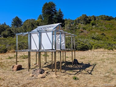 Lighthouse, 2025. Mark Baugh-Sasaki. Stainless steel, CNC-cut aluminum panels, acrylic sheet, Sonoma fieldstones.