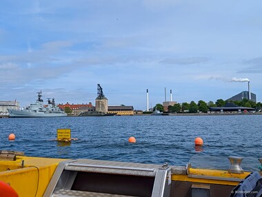The Masting Crane and the HDMS S&aelig;len, a decommissioned Royal Danish Navy submarine, along with a couple of other decommissioned Navy ships