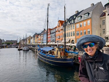 Lori poses in front of the picturesque Nyhavn.