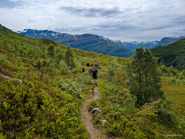 Mats leads Lori, Larry, and Toby out of this lovely valley.