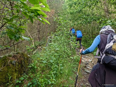 Ron, Donna, Cindy, and Lori climb the trail lined with ancient stones to the hotel.